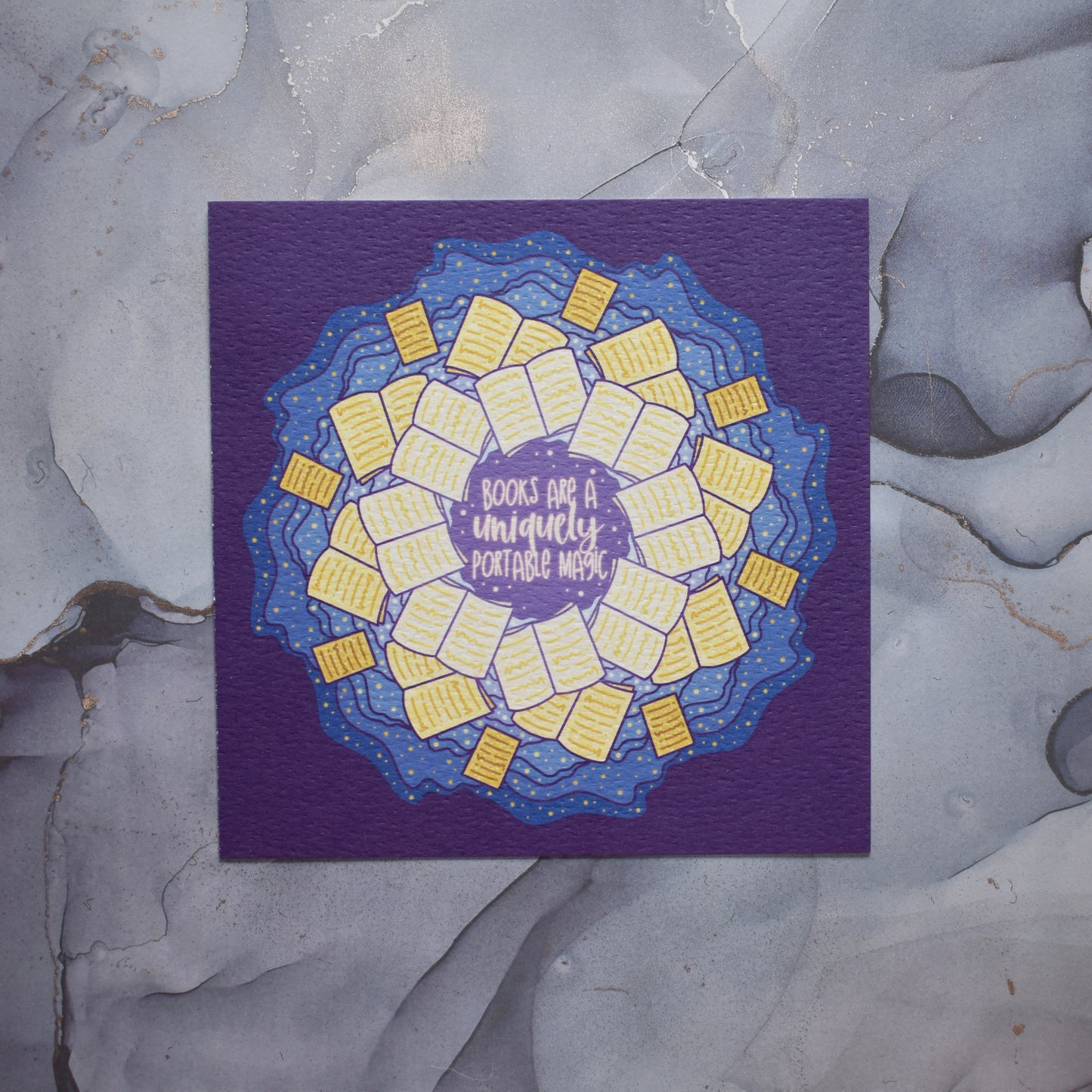 Square print featuring a repeating pattern of yellow open books and blue swirls with purple around the edge. Damage to print down left edge. Design reads books are a uniquely portable magic in yellow at the centre of the design. Background is grey watercolour style.